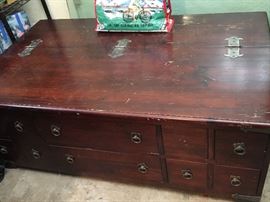 Coffee Table with drawers on one side (spanning half way through). The opposite side, opens like a chest ~