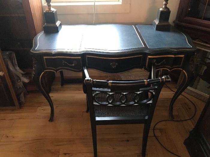 Beautiful Drexel Neo Classical  black french desk with  gold leaf trim,  brass drawer pulls and corner peices with nice patina,  a blue green leather top. Drawers have velvet lining. Final Sale Price $ 295.00                               Class Act!!