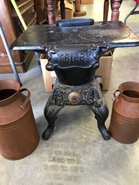  Small Cast-Iron Woodstove, great working condition, perfect for outdoor or indoors. Final Sale Price  $ 80..00