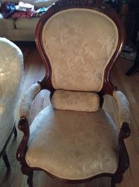 Walnut Ladies Fruit Carved Chair  with cream on  gold ,new damask with cherub angels, excellent shape, and very comfortable.          Final  Sale Price             $ 250.00