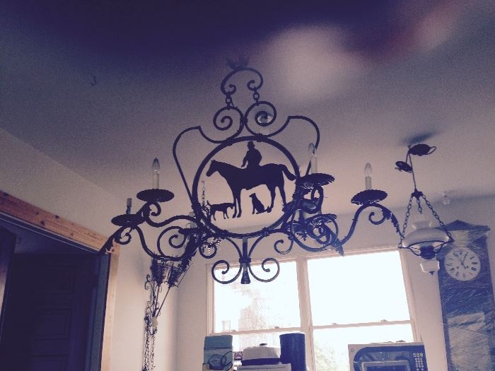 Primitive Iron Light Fixture,  with hand cut horse and rider with hunting dogs , perfect for putting over a harvest table.  Sale Price 400.00 one of a kind!!!!