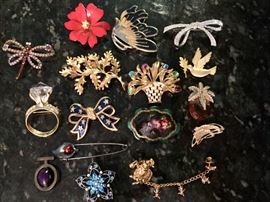 Assorted costume pins