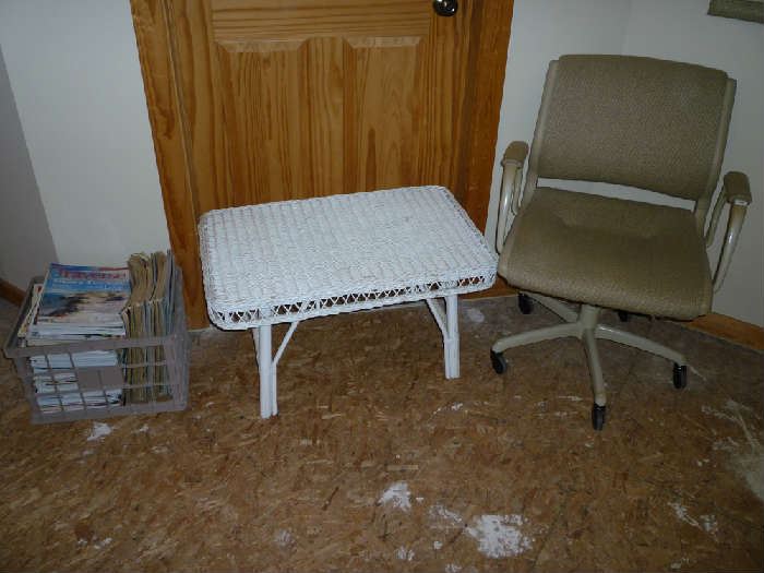 WICKER TABLE, DESK CHAIR, MAGAZINES