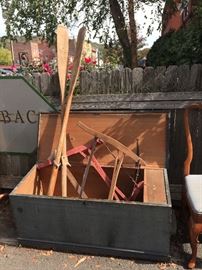 Wooden trunks, vintage two-man saw, vintage oars, etc.