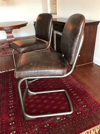 Pair of leather/steel chairs
