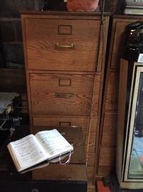 Two 4 drawer oak filing cabinets