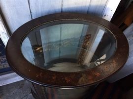 Decorative top of curio cabinet.
