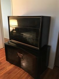 Mid century lines and killer hardware on the chest!