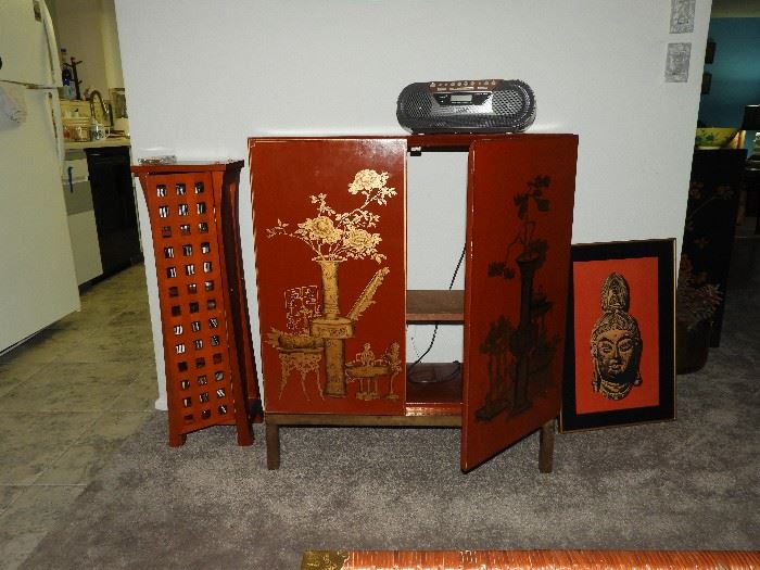 Small red Oriental style armoire, CD jolder