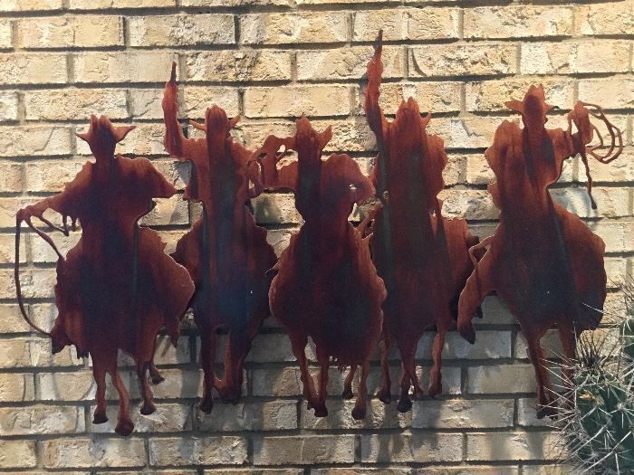  Metal cowboys on horses wall art