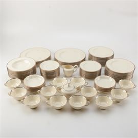Lenox "'Montclair" Tableware Set: A Lenox Montclair tableware set. This ninety-six piece set of Lenox tableware is presented in the Montclair pattern with a platinum rim on an ivory body. The set includes twelve 10.5" dinner plates, twenty-four 8.5" salad plates, twelve 6.5" bread and butter plate, eleven 8.25" bowls, eleven 5.5" bowls, twelve teacups, twelve saucers, one creamer and one lidded sugar bowl. The base is marked to the underside “Lenox Montclair Made in USA.”