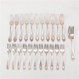 1847 Rogers Bros. "Old Colony" Silver-Plated Fork Set: A set of silver-plated forks by 1847 Rogers Bros. This is in the Thomas B. Lasher designed Old Colony pattern, first introduced in 1911, which features a floral accented handle with pierced tip. The twenty-three piece set includes eleven salad forks, eleven dinner forks, and a meat fork, all marked “1847 Rogers Bros.” to the backs. All handles have personalized engravings of “A” except for meat fork.