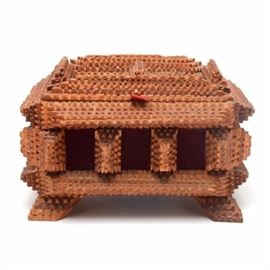 Vintage Handmade Tramp Art Box: A vintage handmade Tramp Art box. This hand-carved box features notched, geometric wood detailing with red velvet sections, resting on four wooden feet and a padded brocade interior. The piece is signed to the bottom by maker John Gahman with the year 1968.