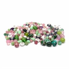 Lamp-Blown Glass Beads: An assorted group of lamp-blown glass beads in a variety of colors and size. Lot also includes ten white and ten black trollbead style beads.