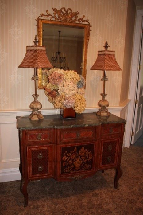 Decorative Mirror, Antique Inlaid Cabinet with Marquetry, Pair of Lamps and Floral Arrangement