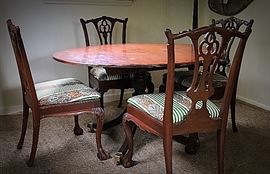 This is a beautiful Baker oval pedestal table with in-lay. The chairs are exceptional. Can be used in eat-in kitchen, breakfast room or small  formal dining room. Can seat up to 
six people. $175