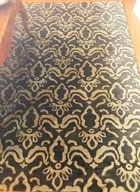 High quality wool rug, 5 x 7, like new condition.  Earth tones, brown, beige with chandelier print. $30