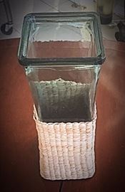 Simple and stylish wicker wrapped vase to accent all varieties of flower arrangements.  