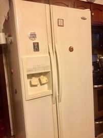 Good condition works great side by side whirlpool fridge 