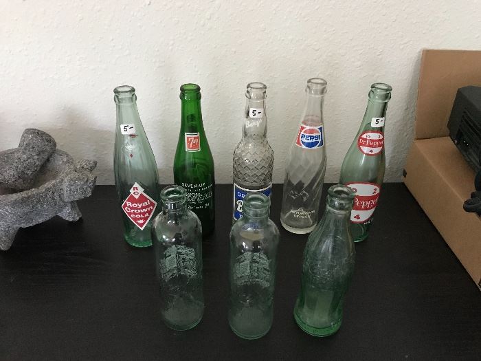 Vintage glass pop (soda) bottles. 3 Coca-Colas, Dr Pepper, Royal Crown Cola, 7up, Pepsi, ...Price at estate sale: $5 each