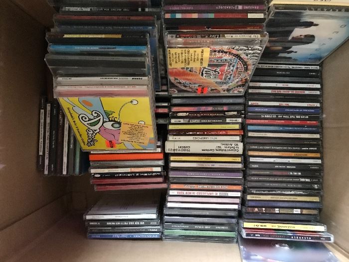 Over 150 CD's from the 80's and 90's. Rock, Pop, Alternative, etc. Price at estate sale: $2 each