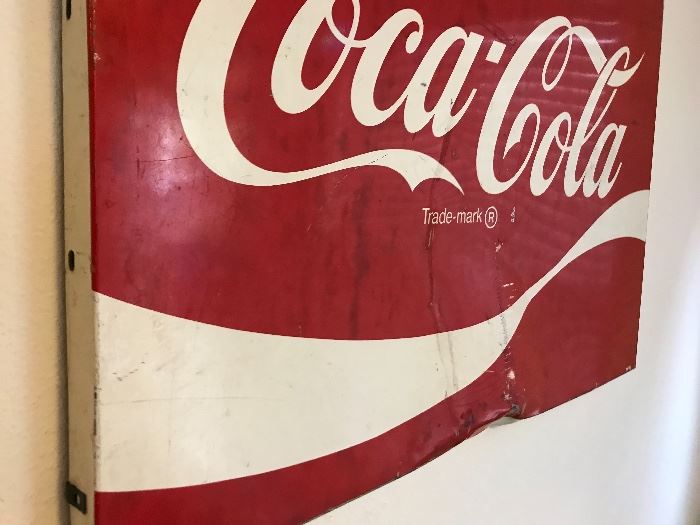 Vintage Coca-Cola metal sign. (Price ranges from $125-200) Price at estate sale: $100 