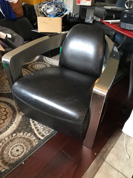 Sinclair aviator club chair. Retails for almost $2,000. Price at estate sale: $300