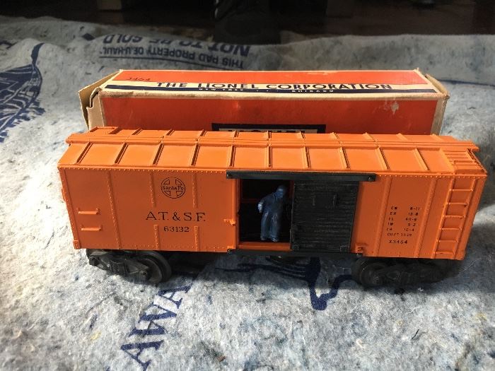 Lionel Electric Trains Orange box car #3464. Lionel Electric Trains. This item will be sold as a complete collection for $2,000. It is the only product that will not be discounted on Saturday, 11/18.