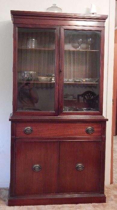 This Mid-Century China Cabinet Measures 68" High, 34" Wide, 13.5 " Deep at Top, 16.5" Deep at Bottom