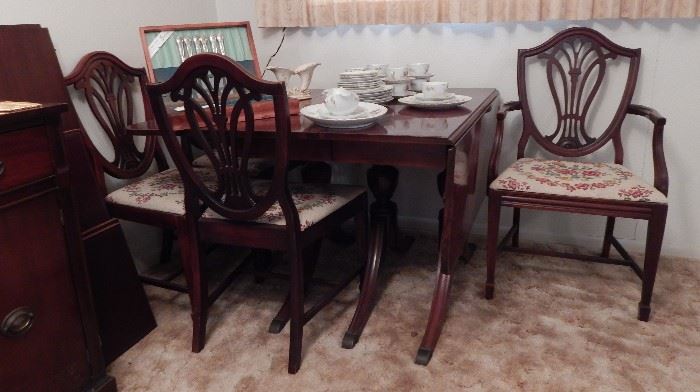 Drop-leaf Table by Bernhardt Furniture Co. Has 6 Chairs, and Comes with 3 Leafs, and Table Covers.