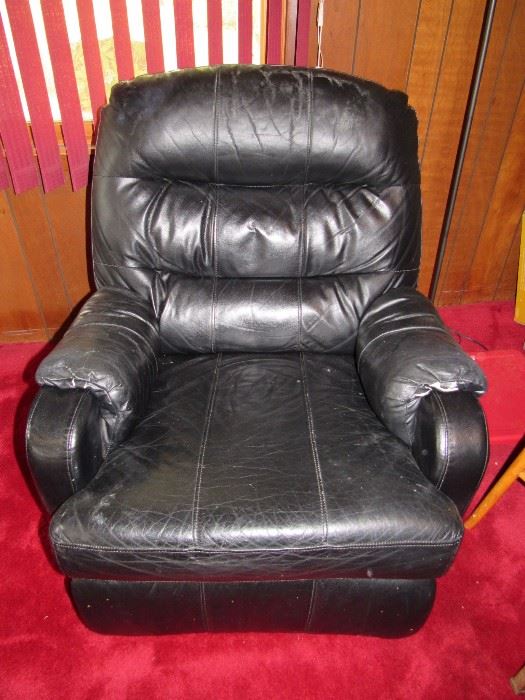 Beautifully distressed black leather recliner