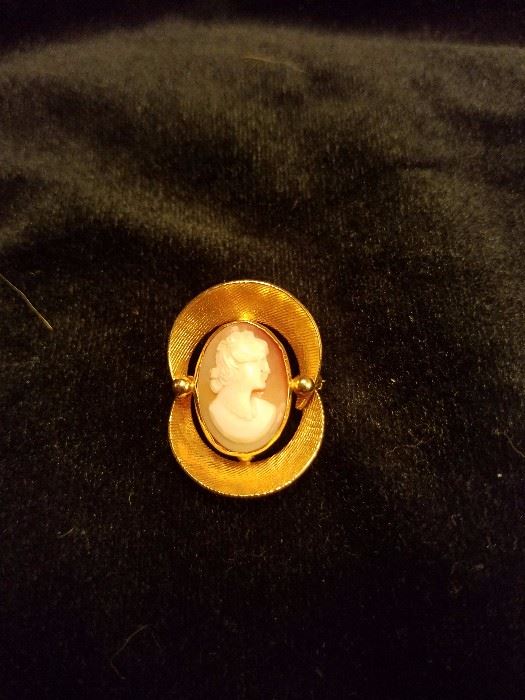 14Kt gold cameo, part of a collection of gold, silver and costume jewelry.