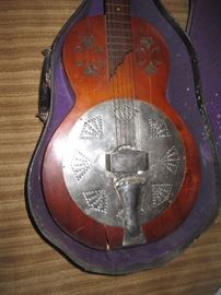 Basement: Resonator guitar chrome cover