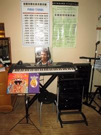 Basement: Yahama KeyBoard psr-Gx76 Jimi Hendrix LP & CD set, Black Music Stand, 4 Guitar Stand,