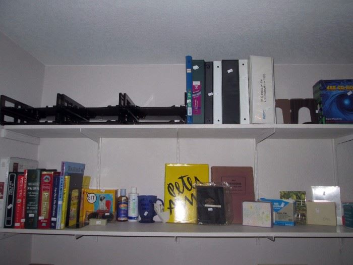 Upstairs Bedroom Right: Paper Trays, Note Books, Dog Training Books, Cartoon Book by Peter Armo