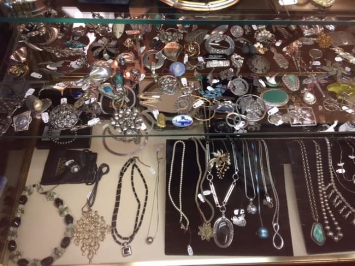 Silver Brooches, Pins, and Necklaces