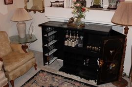 Carved bar with stone inlay, perfect for entertaining guests!