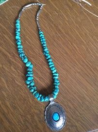 Turquoise and silver pendant necklace