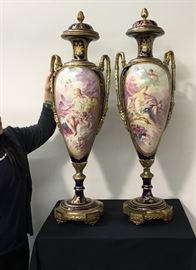 Pair Monumental Hand Painted Sevres & Bronze Covered Urns, late 19th century