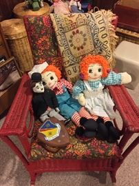 Red wicker chair, vintage dolls