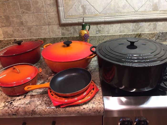almost new LeCresuet cookware and notice the black one to the right was never used  Thirteen and 1/4 quart dutch oven--It is HUGE!