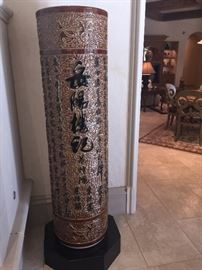 five ft all glazed ceramic Asian urn that includes the wooden stand