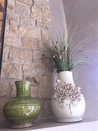 two of several ceramic glazed pots