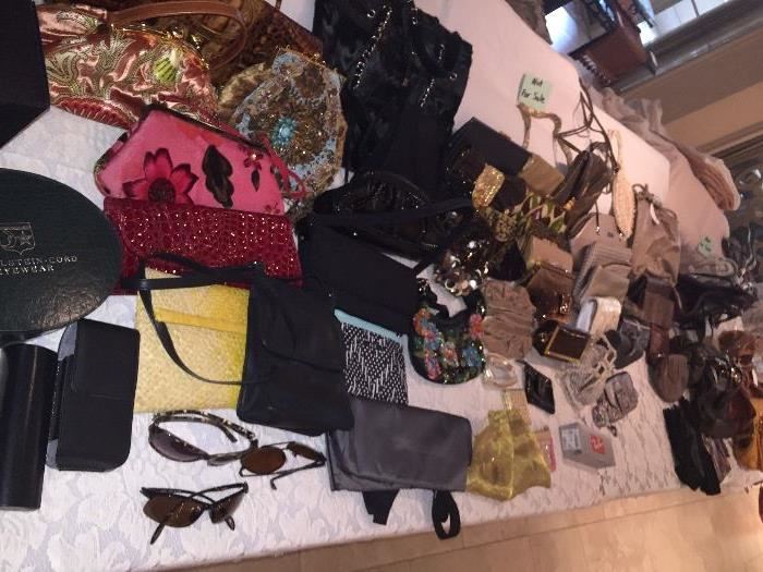 Dozens of designer handbags, and a few designer sunglasses 
