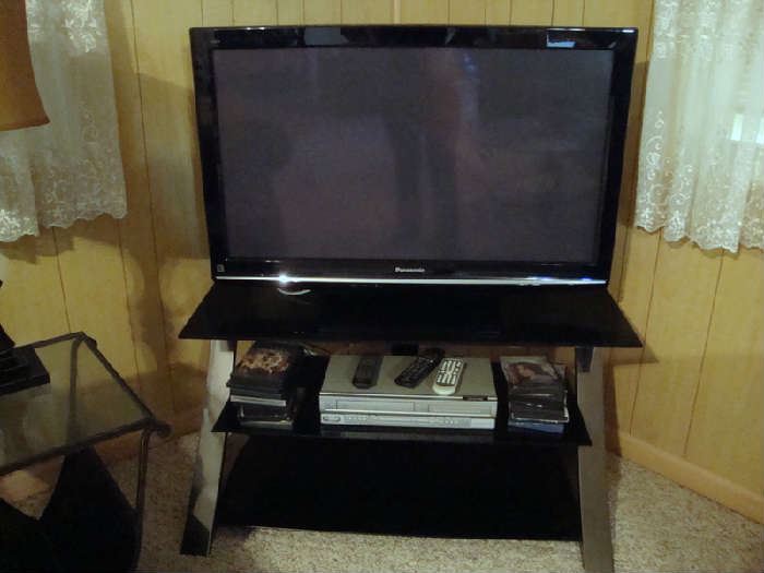 Flat Screen TV,  Stand, DVD Player