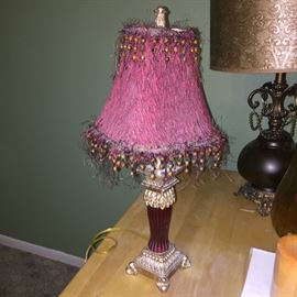 Lamp with purple glass base