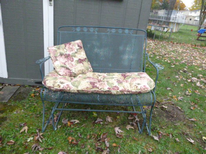  Wrought Iron Glider  http://www.ctonlineauctions.com/detail.asp?id=652585