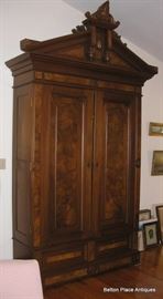 Victorian Renaissance Large Armoire in Burl walnut, elaborate carving, comes apart for removal, over 9 feet tall. 9feet 9 inches tall, 18 1/2 deep, 4 ft 10 inches wide. Could be attributed to Allen Bros Philadelphia.