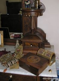 Carving above Glove Boxes on Dresser