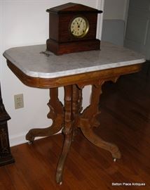 1880's Marble Top End Table, 33 inches wide, 22 inches deep, 31 inches tall.